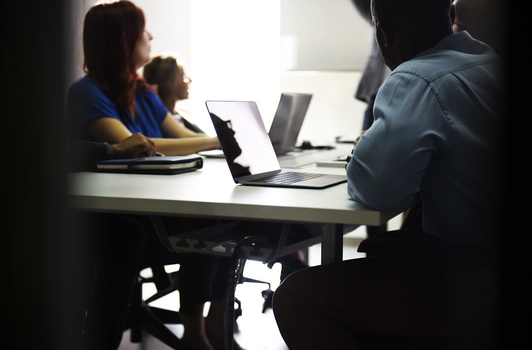 Group of diverse people attending startup business course